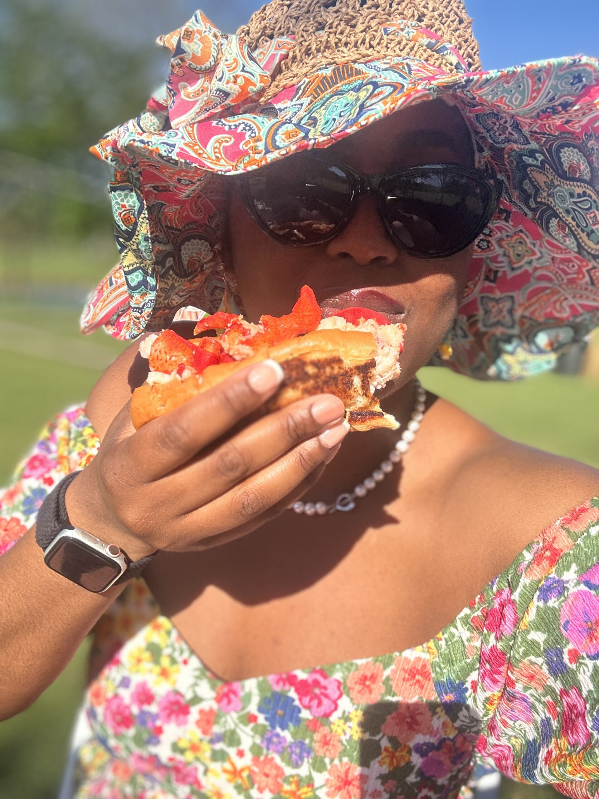 Deanna eating a Connecticut Lobster Roll